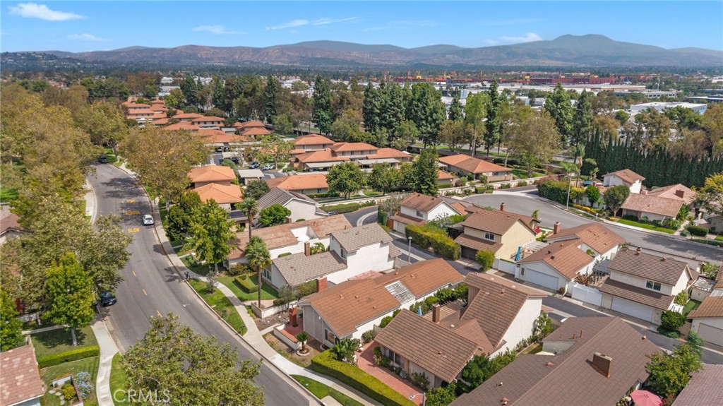 14272 Raintree Road Tustin, CA 92780 - Photo 20 of 24 an aerial view of residential house with outdoor space and mountain view