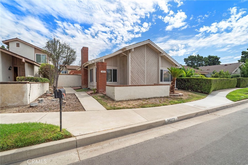 14272 Raintree Road Tustin, CA 92780 - Photo 2 of 24 a house view with a outdoor space