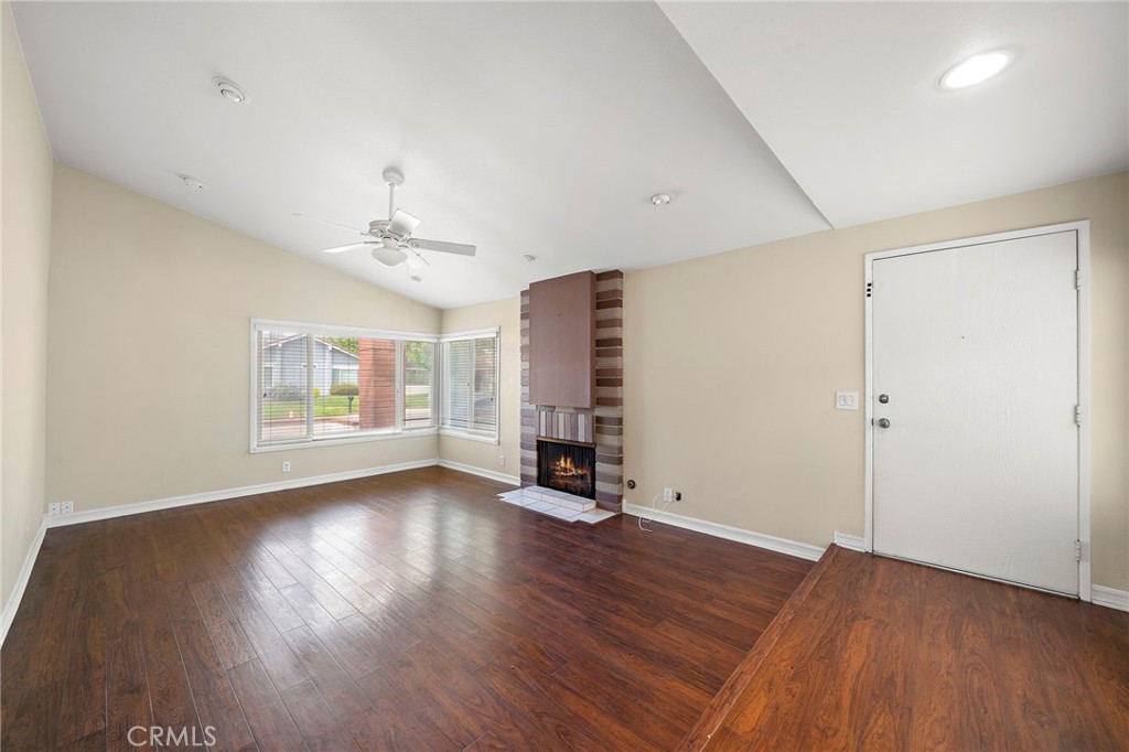 14272 Raintree Road Tustin, CA 92780 - Photo 3 of 24 wooden floor in an empty room with a window