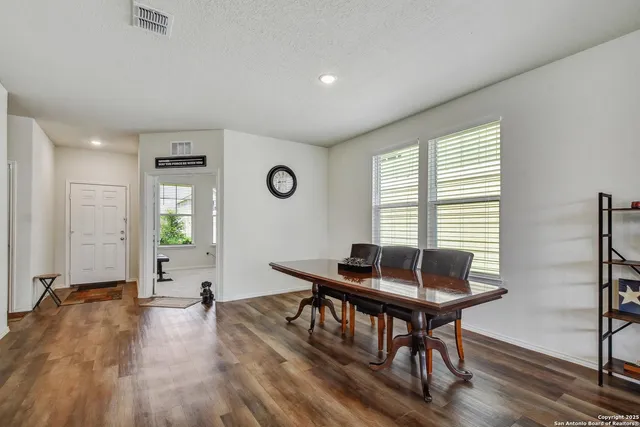 a view of a livingroom with furniture and window