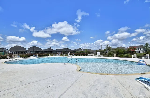 a view of lake with green space