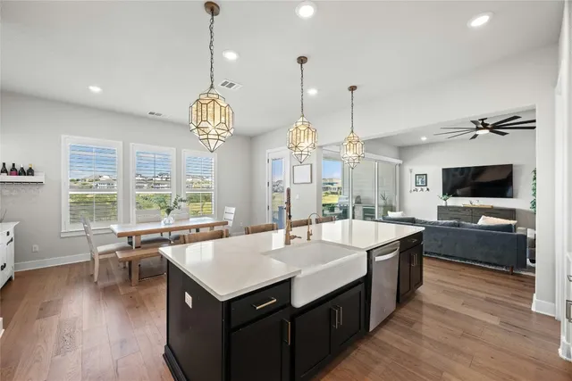 a kitchen with a stove and cabinets