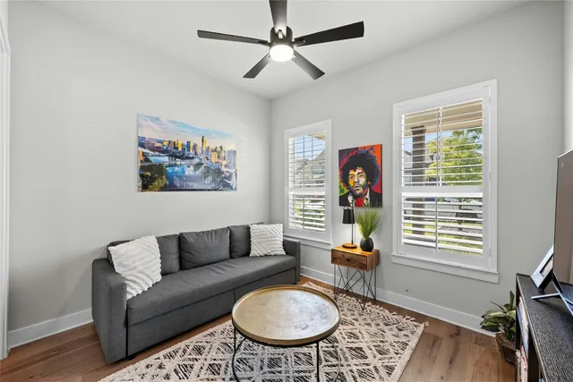 a bathroom with a shower and a sink