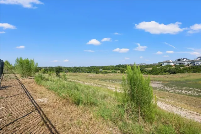 a front view of a house with yard