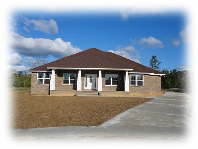 3630 Ranch Drive Crestview, FL 32539 - Photo 1 of 1 a front view of a house with yard