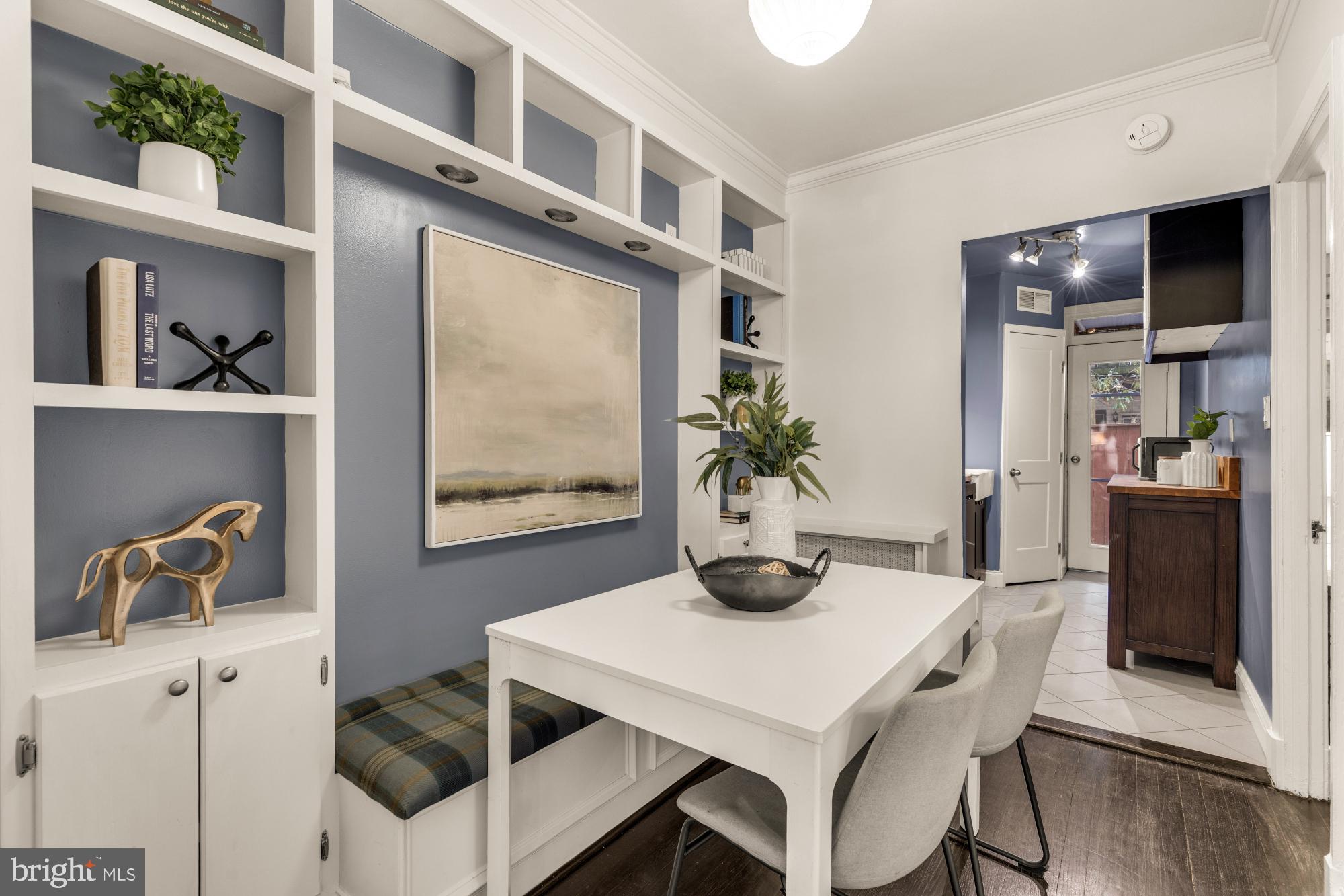 1127 C Street Southeast, Unit 2 Washington, DC 20003 - Photo 11 of 17 a dining room with furniture and window