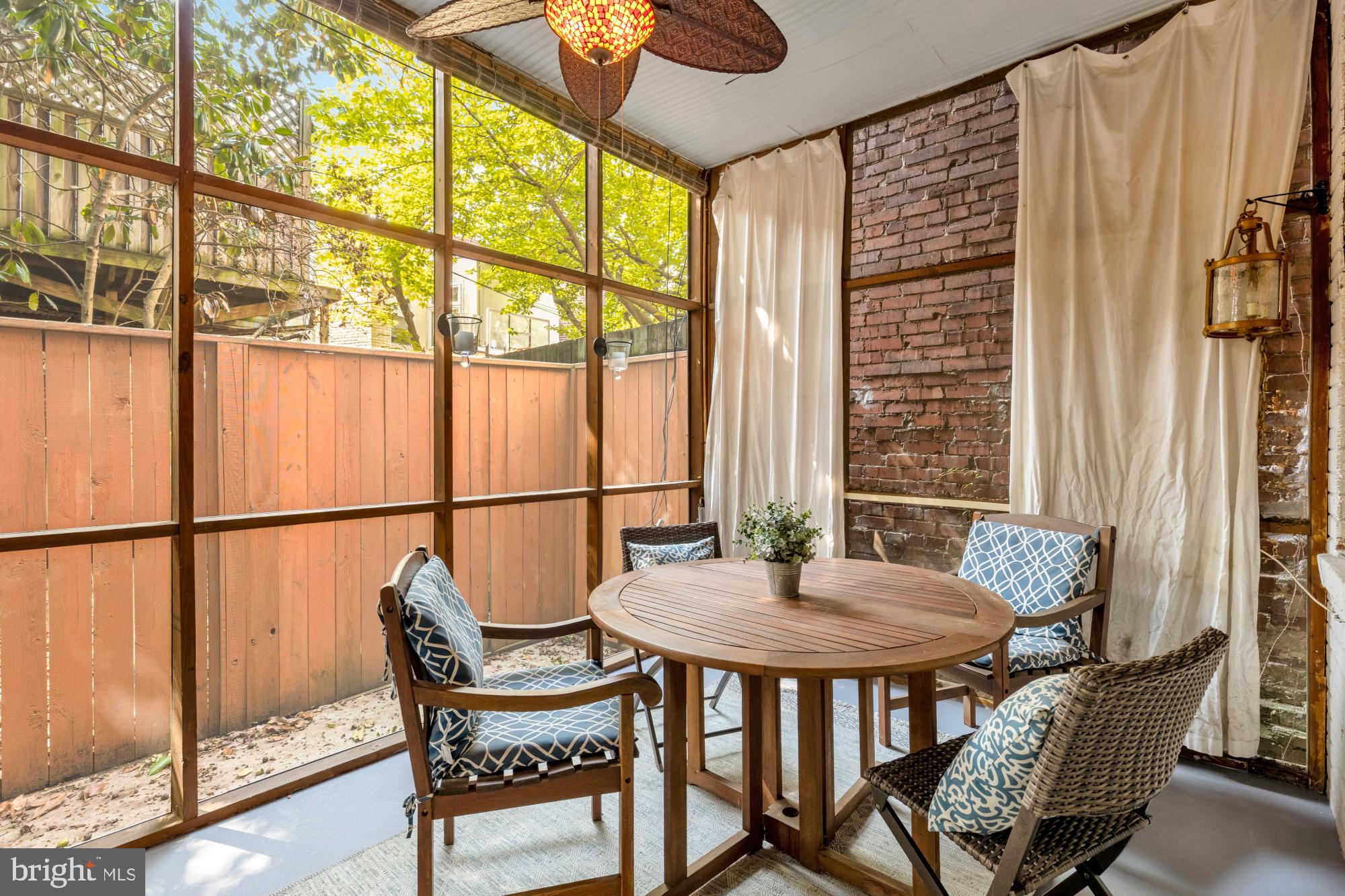 1127 C Street Southeast, Unit 2 Washington, DC 20003 - Photo 15 of 17 a view of a dining room with furniture and a window