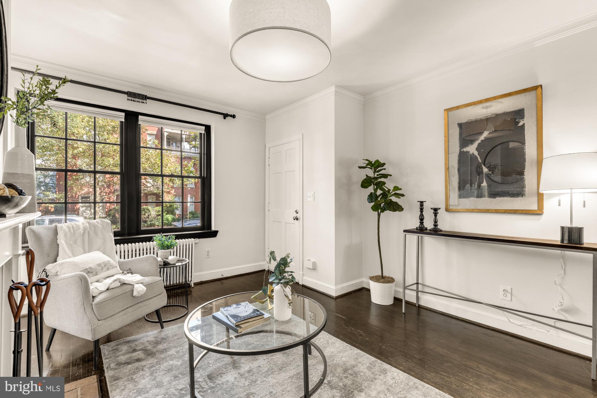 1127 C Street Southeast, Unit 2 Washington, DC 20003 - Photo 5 of 17 a living room with furniture and window