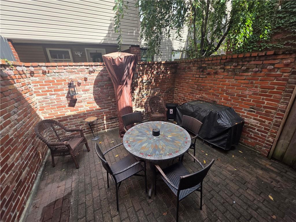 604 Middle Street Pittsburgh, PA 15212 - Photo 14 of 47 a view of a chairs and table in the patio