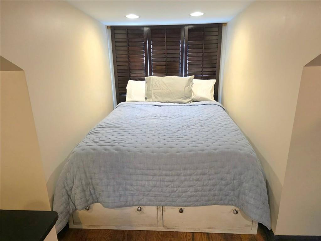 604 Middle Street Pittsburgh, PA 15212 - Photo 30 of 47 a bedroom with a bed and a window