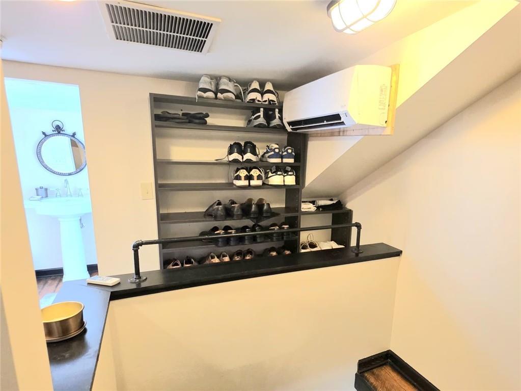 604 Middle Street Pittsburgh, PA 15212 - Photo 34 of 47 a kitchen with stainless steel appliances granite countertop a sink and a stove