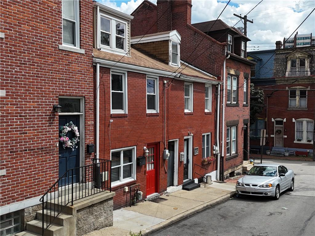 604 Middle Street Pittsburgh, PA 15212 - Photo 45 of 47 a car parked in front of a building