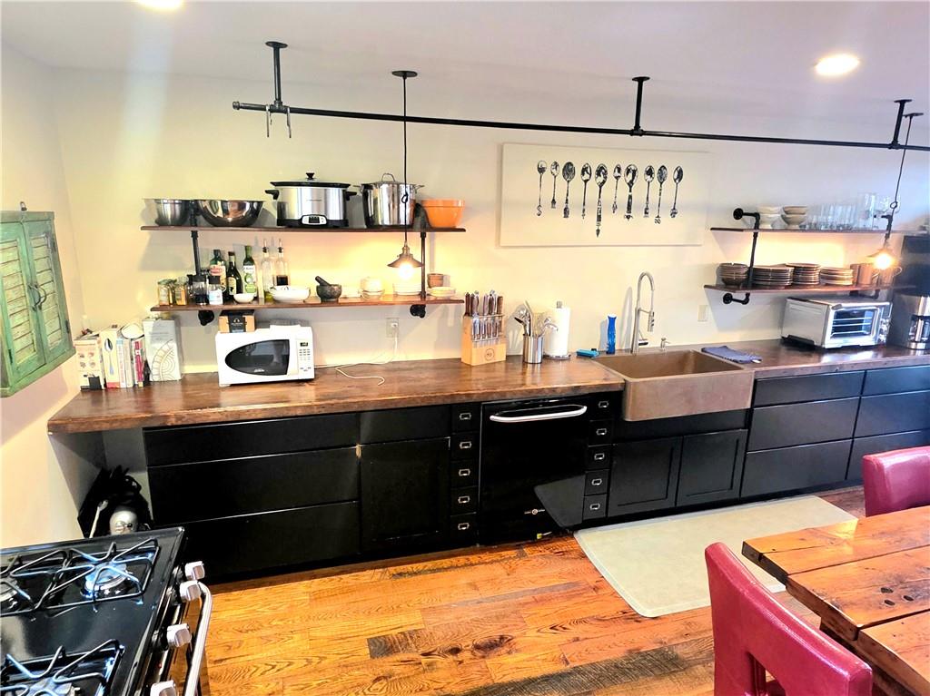 604 Middle Street Pittsburgh, PA 15212 - Photo 6 of 47 a kitchen with a sink and cabinets