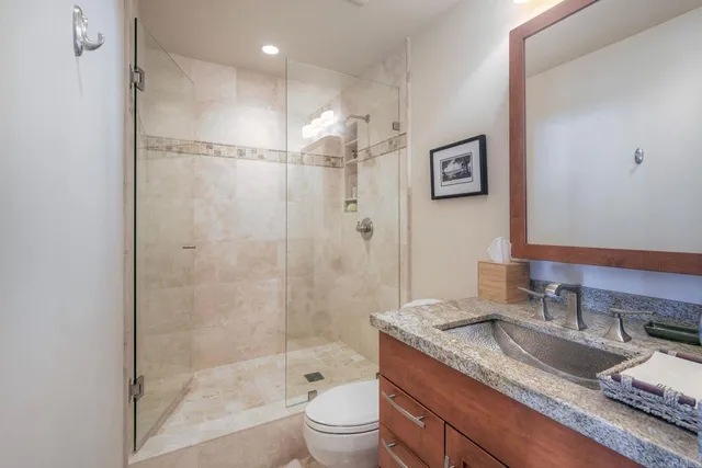 a bed room with a bed and chair