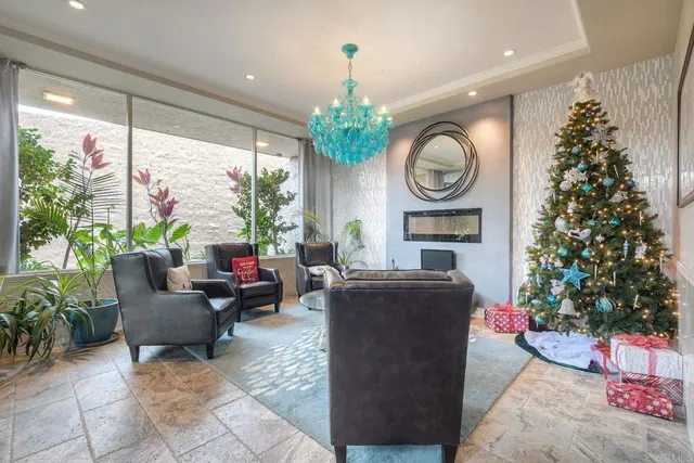 a view of a backyard with sitting area