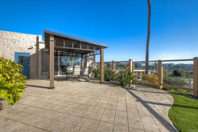 a view of a swimming pool with chairs