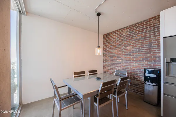 a view of a workspace with furniture