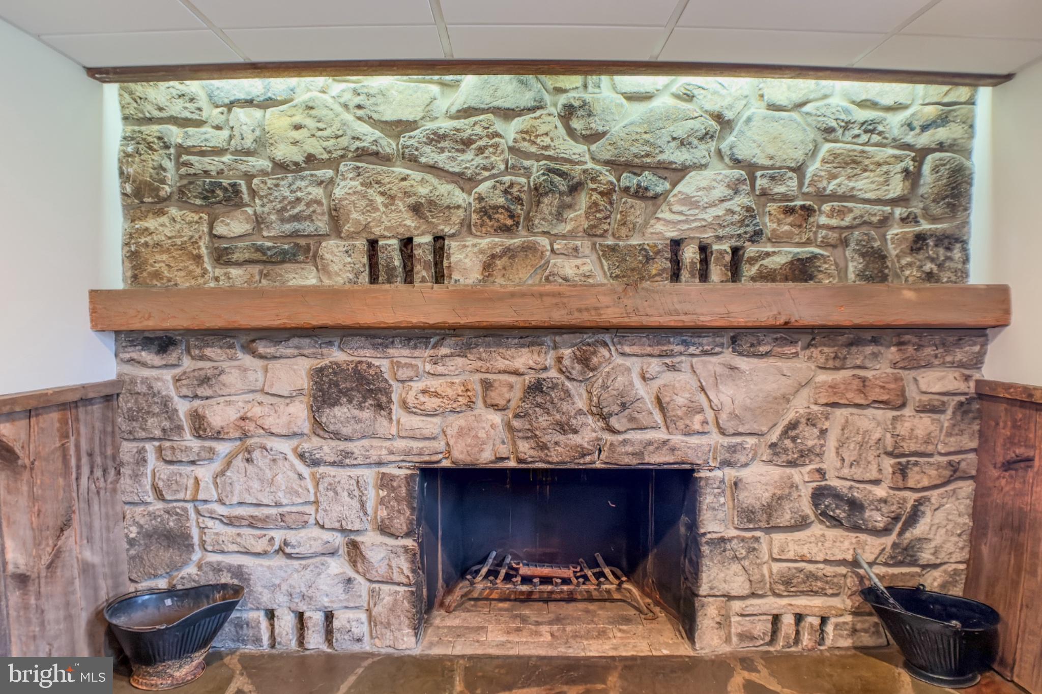467 Swanger Road New Columbia, PA 17856 - Photo 6 of 45 Rustic stone fireplace centerpiece.