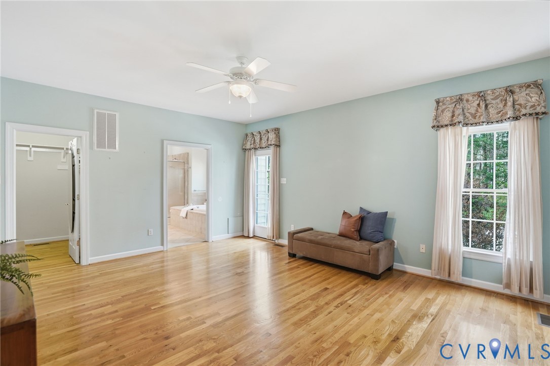 14430 Overlook Ridge Lane Beaverdam, VA 23015 - Photo 30 of 71 a living room with furniture and a large window