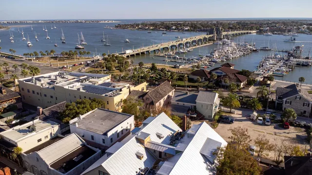 a view of a livingroom with furniture and staircase