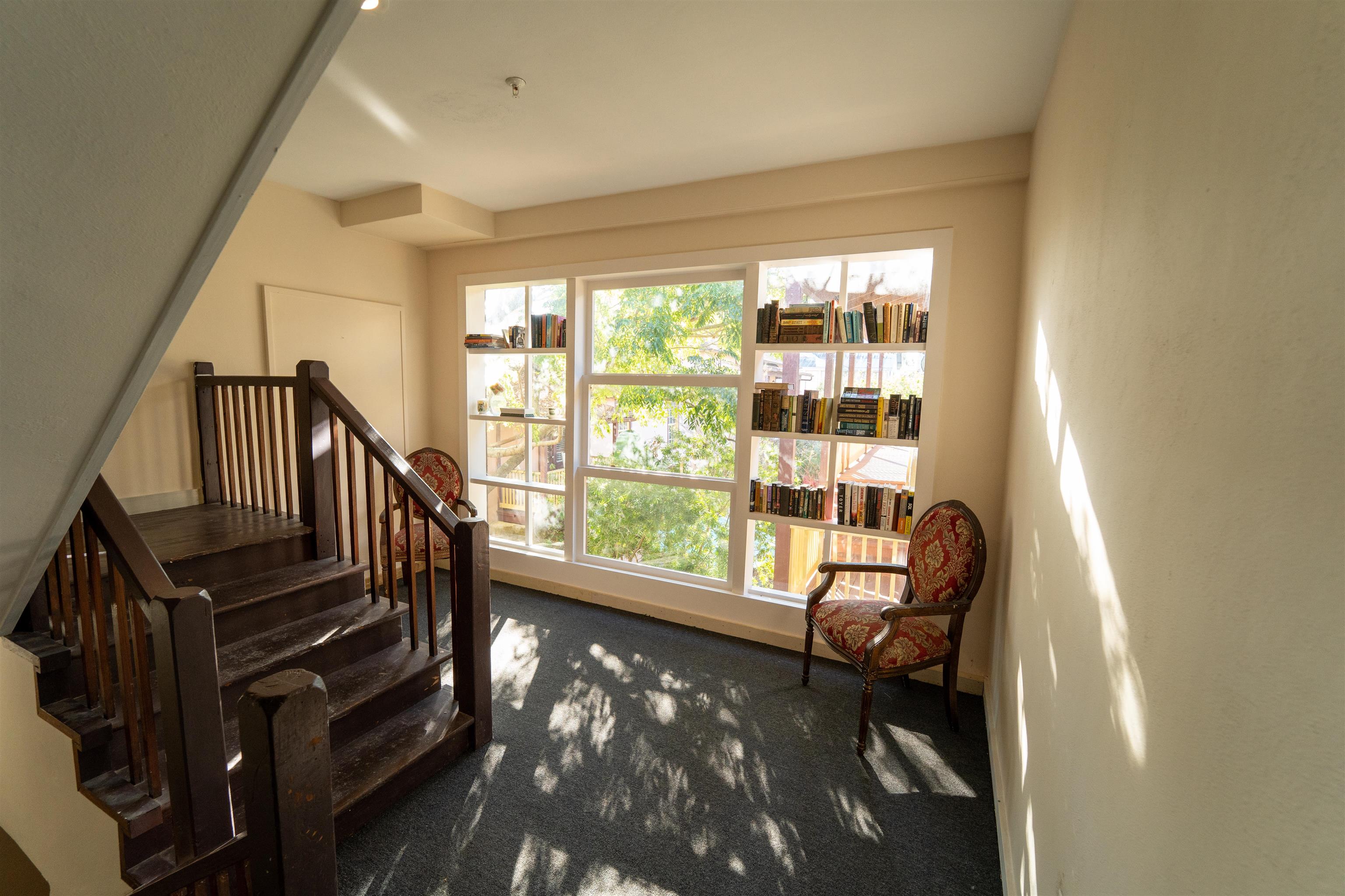 11 Aviles Street, Unit 2D St. Augustine, FL 32084 - Photo 24 of 24 a view of a livingroom with furniture and staircase