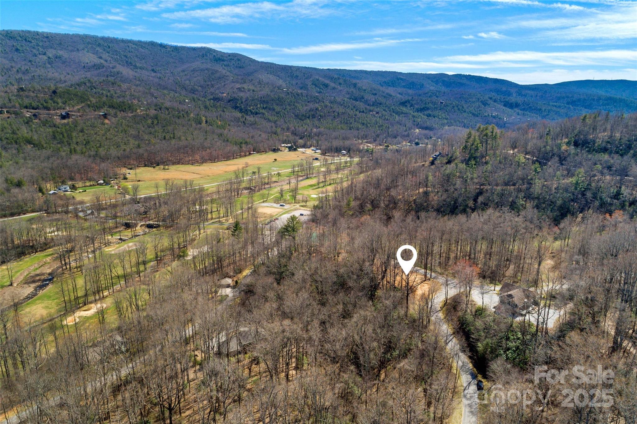 Lot#158 Hunnicut Mountain Road Marion, NC 28752 - Photo 17 of 20 a view of a city with mountains in the background