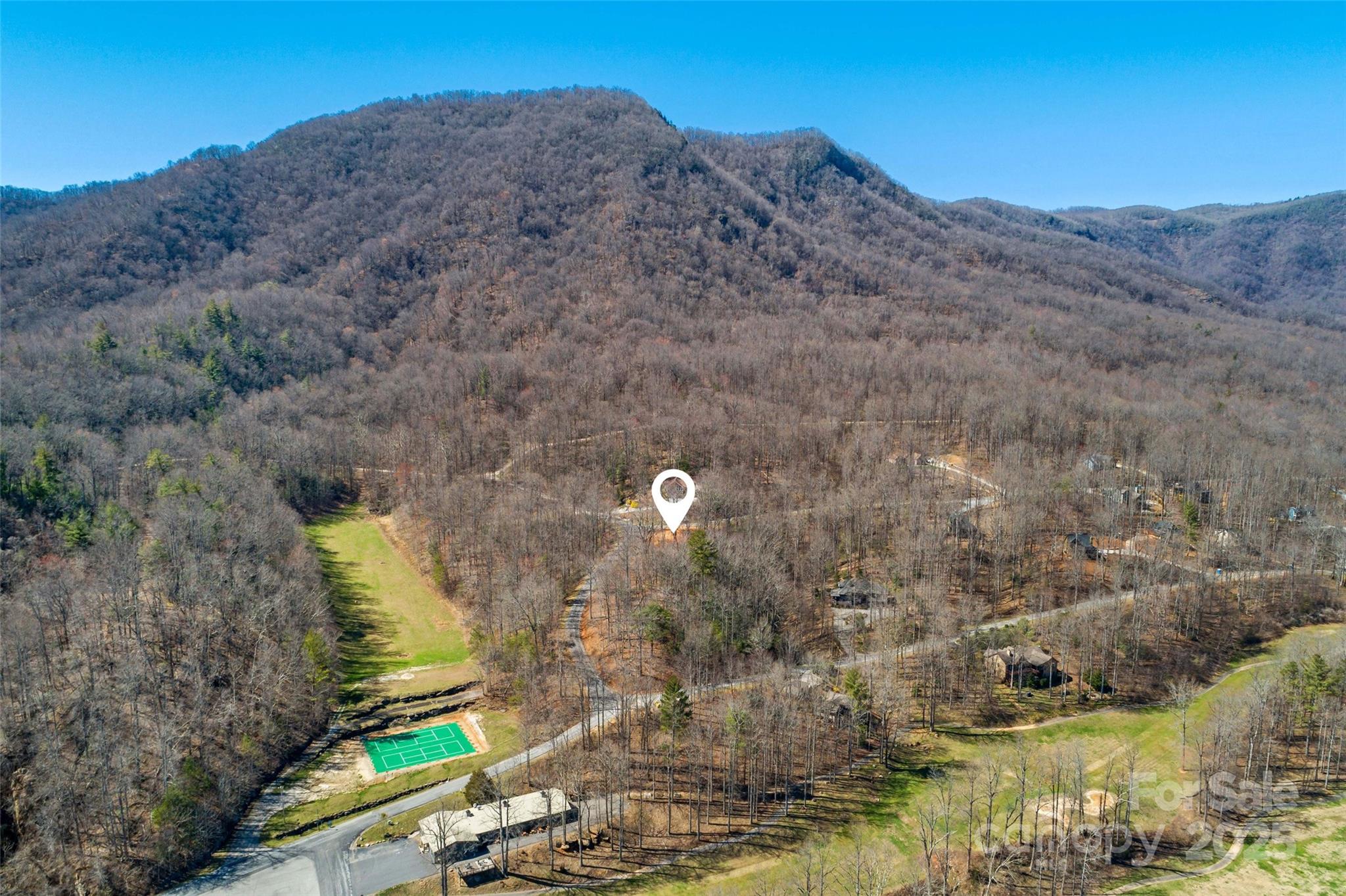 Lot#158 Hunnicut Mountain Road Marion, NC 28752 - Photo 20 of 20 a aerial view of a house with a lake view