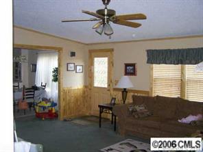 364 Sandburg Road Union Grove, NC 28689 - Photo 4 of 7 a living room with furniture and a window