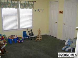 364 Sandburg Road Union Grove, NC 28689 - Photo 6 of 7 a view of a room that has a bench in it
