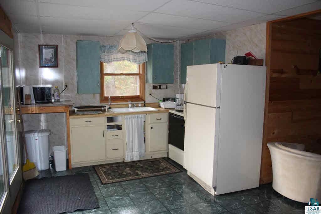8693 South Lyman Lake Road South Range, WI 54874 - Photo 14 of 25 Guest cabin kitchen