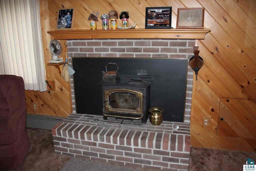 8693 South Lyman Lake Road South Range, WI 54874 - Photo 4 of 25 Main cabin fireplace