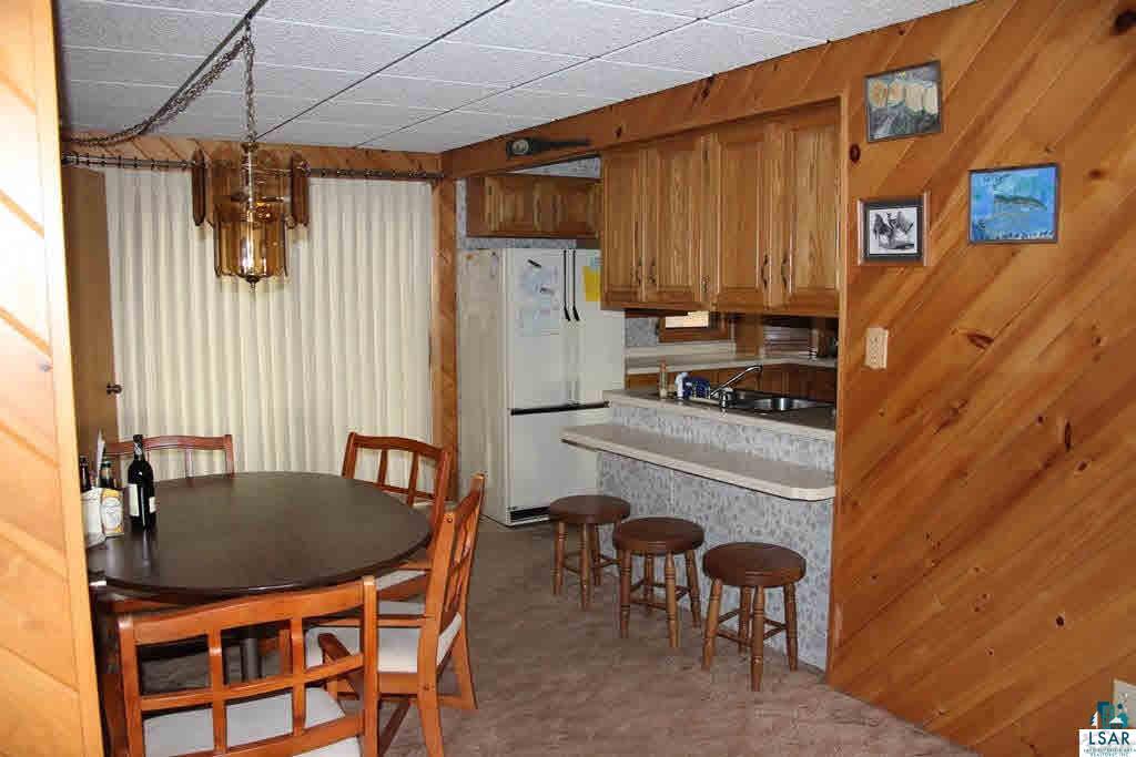 8693 South Lyman Lake Road South Range, WI 54874 - Photo 6 of 25 Main cabin dining area