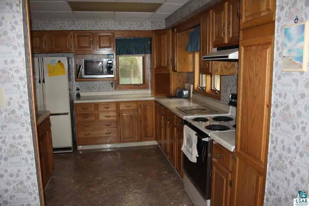 8693 South Lyman Lake Road South Range, WI 54874 - Photo 7 of 25 Main cabin kitchen