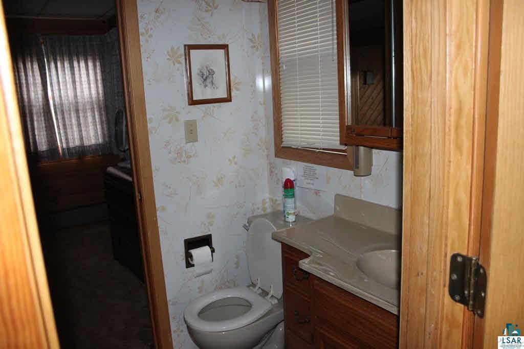 8693 South Lyman Lake Road South Range, WI 54874 - Photo 9 of 25 Main cabin bathroom
