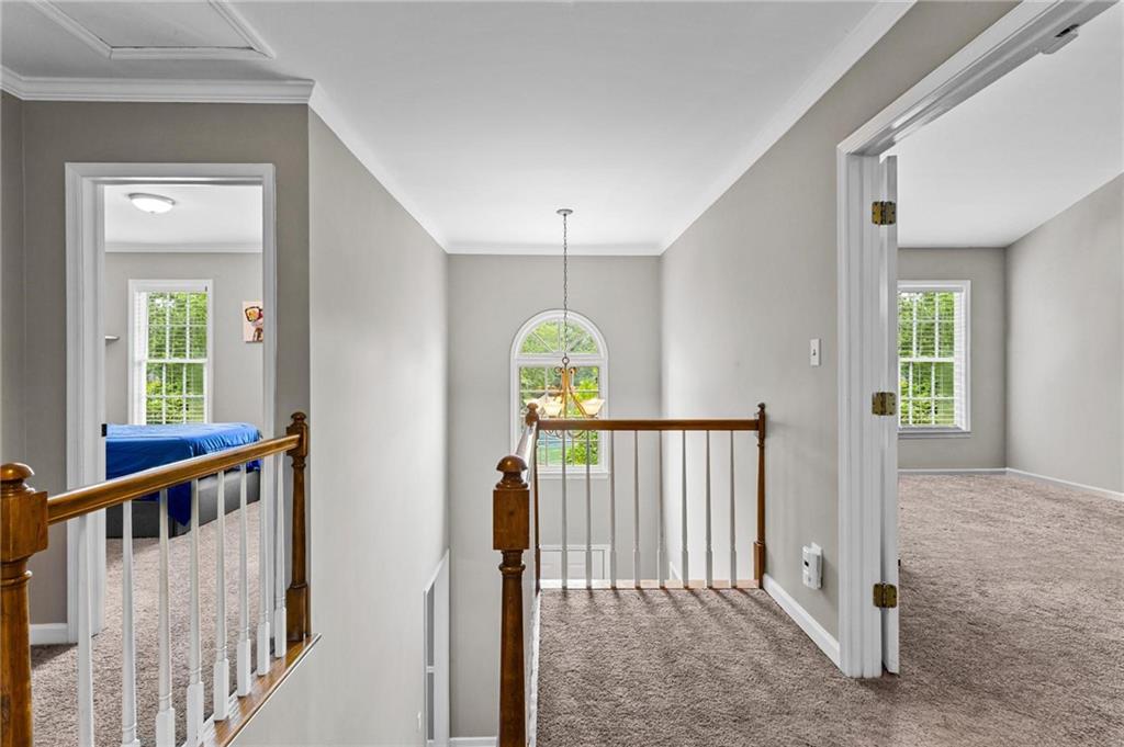 1996 Morning Walk Northwest Acworth, GA 30102 - Photo 12 of 22 a view of a hallway with windows and stairs
