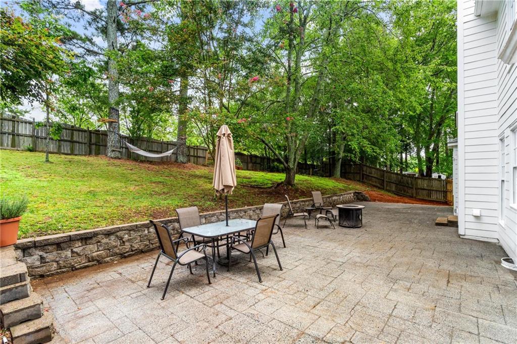 1996 Morning Walk Northwest Acworth, GA 30102 - Photo 19 of 22 a view of a backyard with sitting area