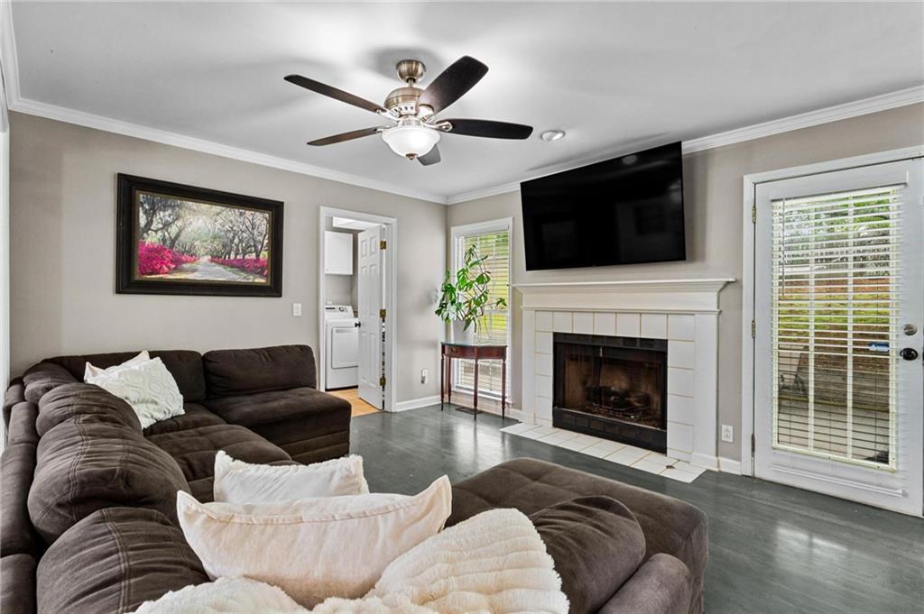 1996 Morning Walk Northwest Acworth, GA 30102 - Photo 4 of 22 a living room with furniture ceiling fan and a fireplace