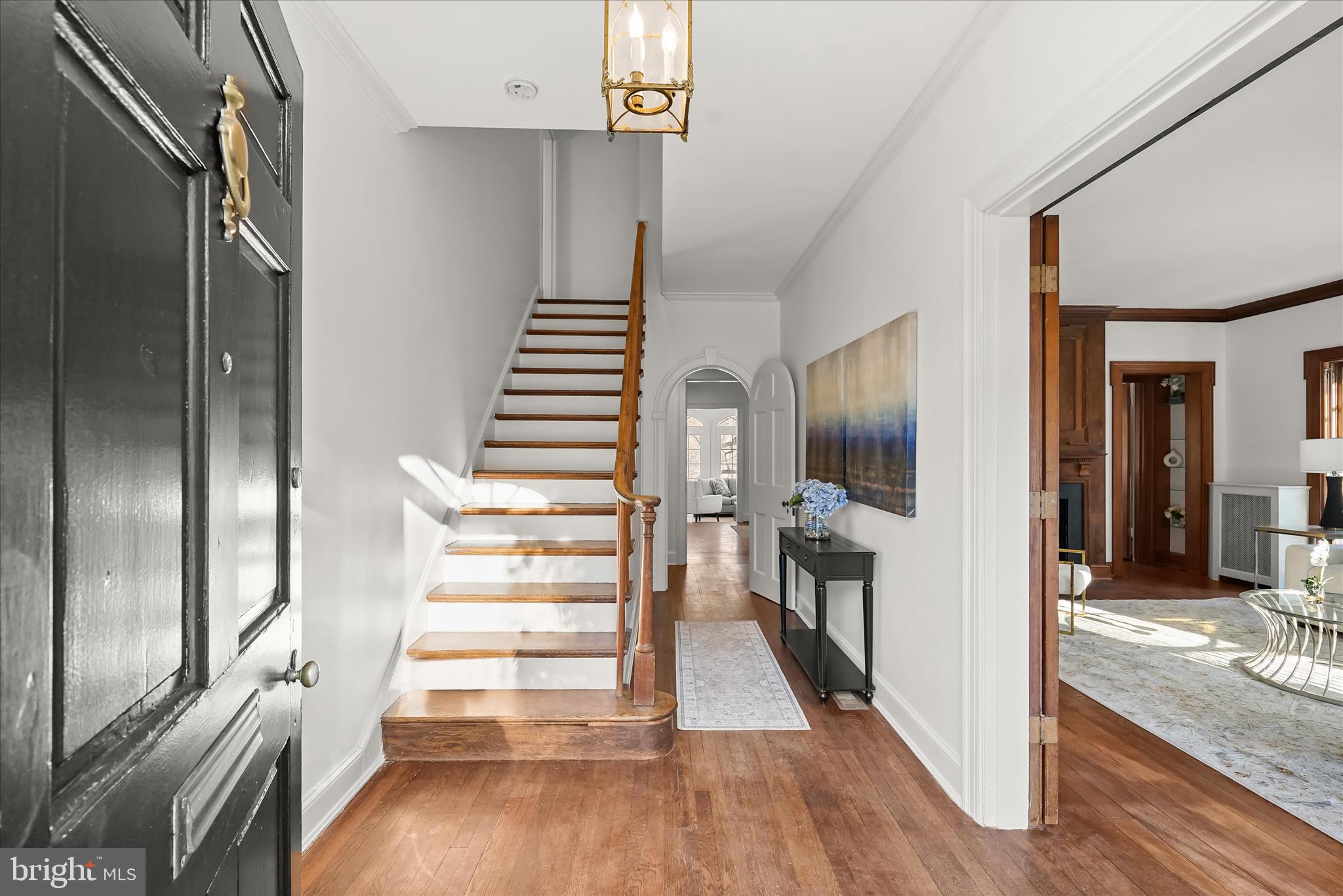 1727 Hoban Road Northwest Washington, DC 20007 - Photo 2 of 25 a view of a hallway with wooden floor and staircase