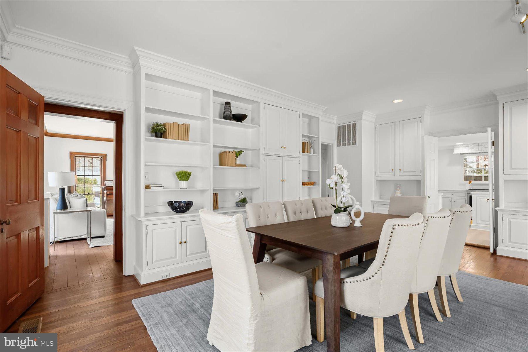 1727 Hoban Road Northwest Washington, DC 20007 - Photo 5 of 25 a view of a dining room with furniture and wooden floor