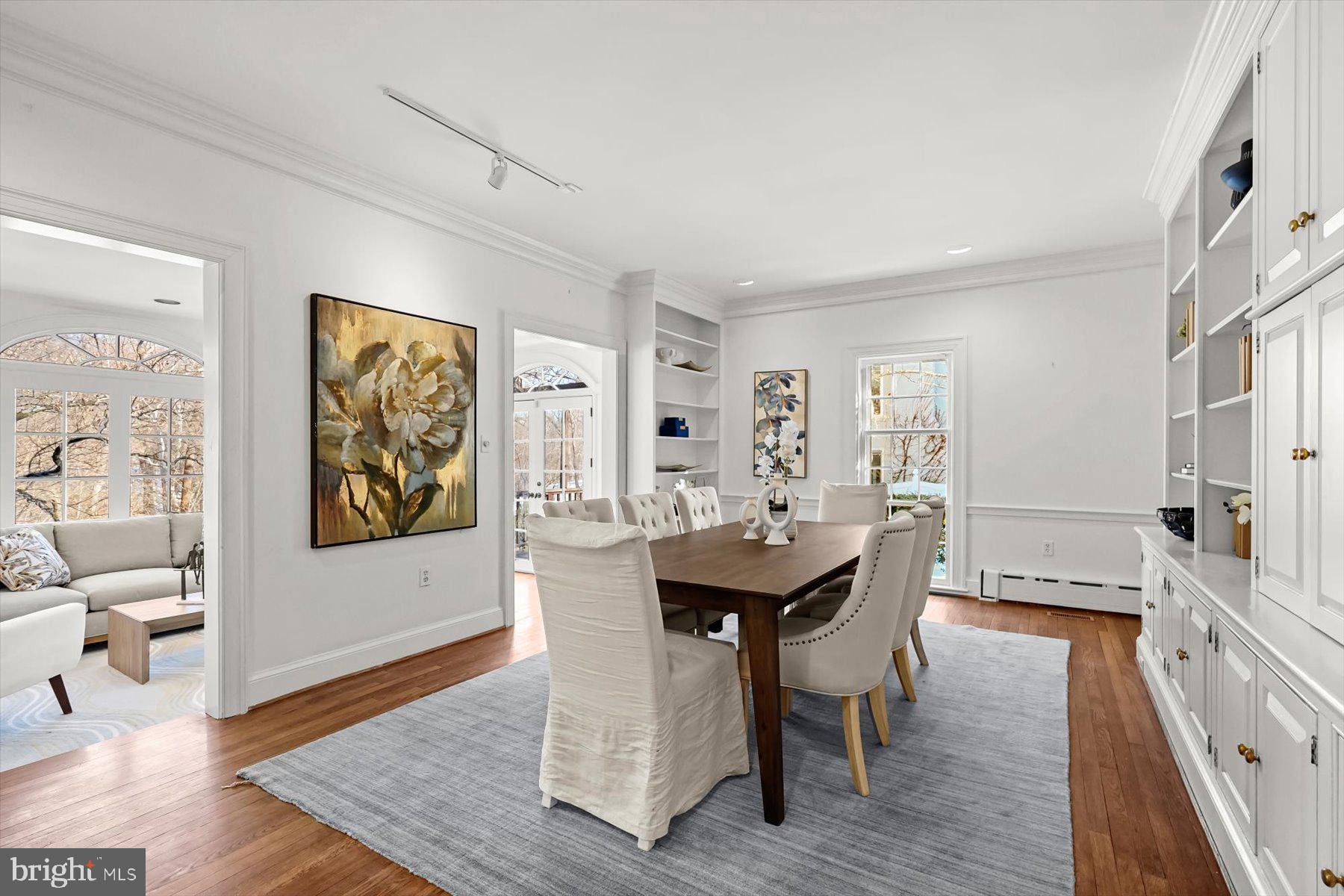 1727 Hoban Road Northwest Washington, DC 20007 - Photo 6 of 25 a view of a dining room with furniture and wooden floor