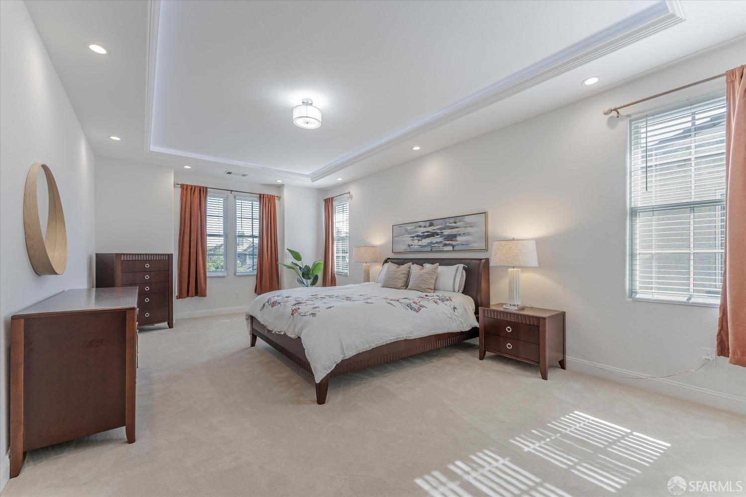 10 Jouett Square Alameda, CA 94501 - Photo 18 of 23 a spacious bedroom with a large bed and a window