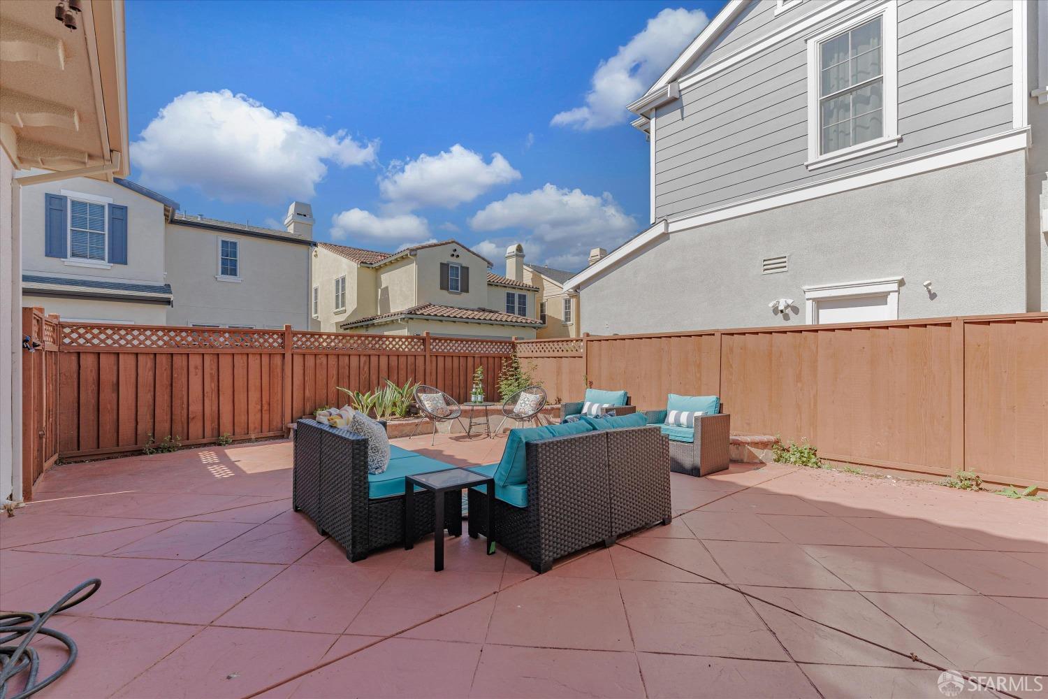 10 Jouett Square Alameda, CA 94501 - Photo 22 of 23 a view of a patio with table and chairs