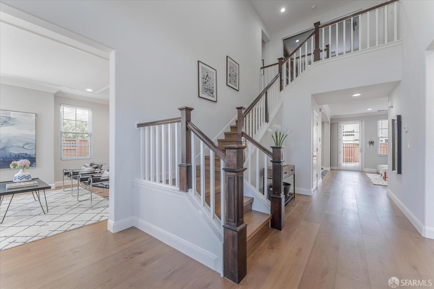 10 Jouett Square Alameda, CA 94501 - Photo 4 of 23 a view of entryway and hall with wooden floor