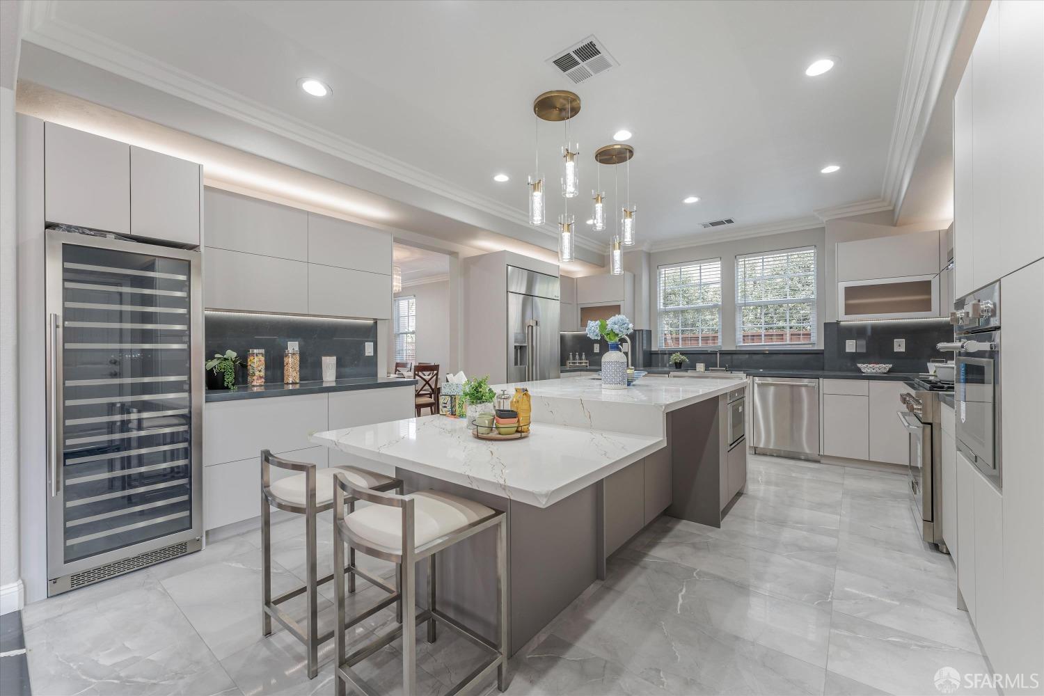10 Jouett Square Alameda, CA 94501 - Photo 6 of 23 a kitchen with a sink stainless steel appliances and cabinets