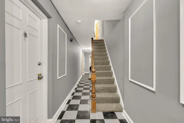 a view of an entryway with staircase