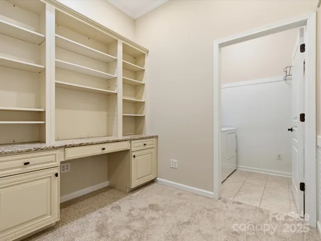 a view of cabinets and window