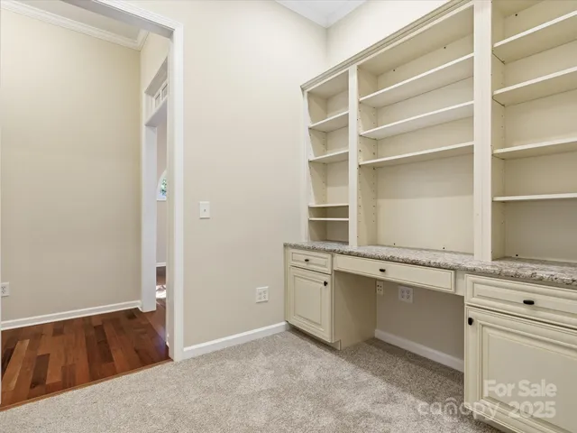 a view of cabinets and window