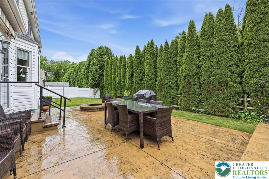 2011 Fieldview Drive Nazareth, PA 18064 - Photo 41 of 52 A private, fenced backyard oasis with a spacious patio, ideal for outdoor entertaining and relaxation.