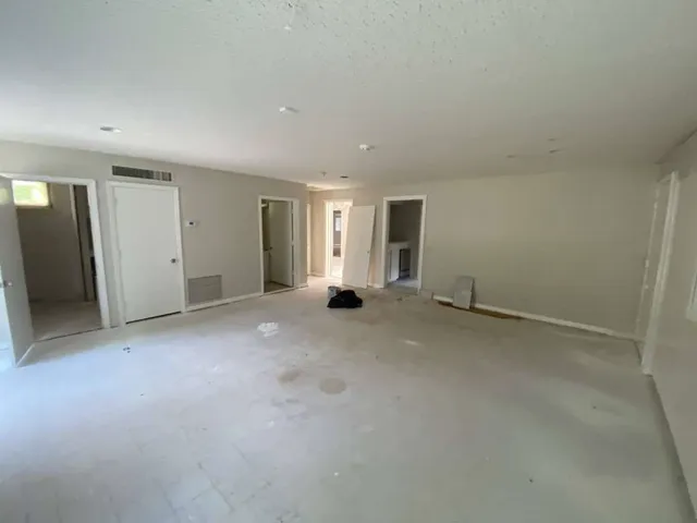 an empty room with windows