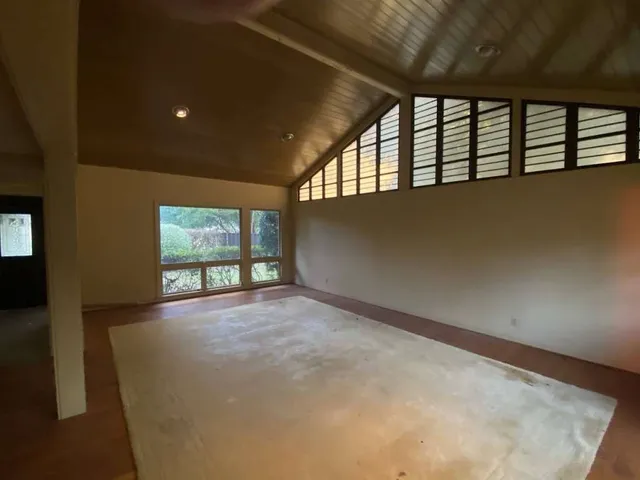 view of an empty room with a window